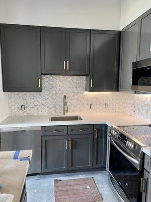 Cabinets AFTER Eddy painted them--perfectly finished and gorgeous!