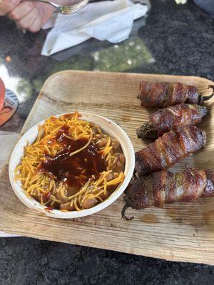 Beans topped with cheese and bbq sauce  & bacon wrapped jalapeños both were excellent