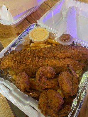 Fish and Shrimp Platter with fries and a caramel churro