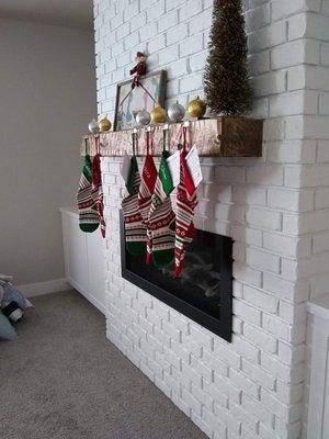 Custom Fireplace - brick veneer, floating mantel.
