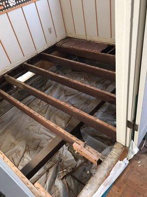 Subfloor removal. Water damaged.