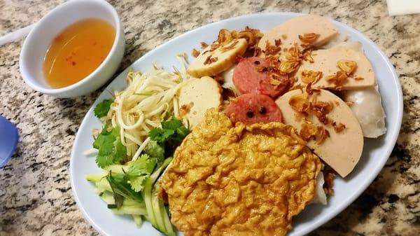 Banh cuon and cha lua (steamed rice cakes and pork meatloaf).