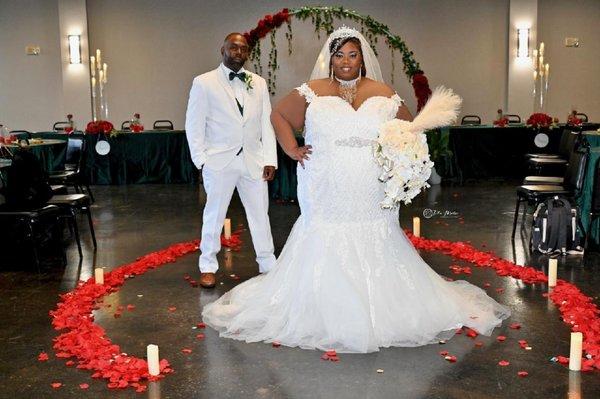 Bride's dress was not fitting added side panel, pearl button and loops, with a bow to the back. Bride was pleased.