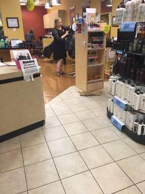 Wife getting her hair done for tomorrow's pictures