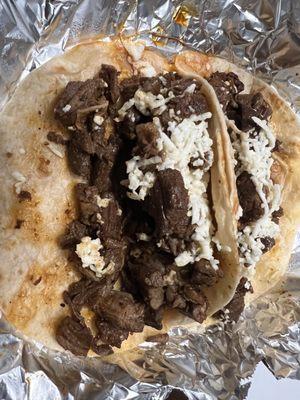 Steak Fajita w/ cheese and extra meat on flour tortillas
