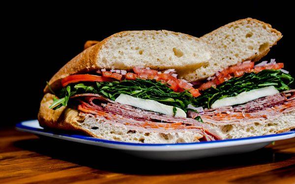 Piled High with fresh mozzarella and prosciutto, on a locally baked ciabatta roll