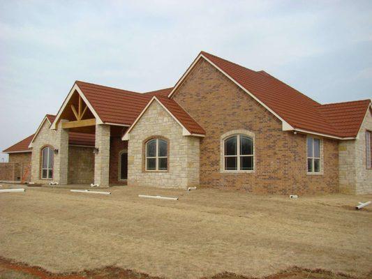 This Metal shingle holds up well to high winds we did this as a new house in 2012