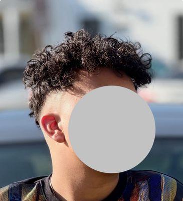 They did my son dirty. It's not even faded. Wtf is this. They ain't even style his curls neither. Chopped his hair up.