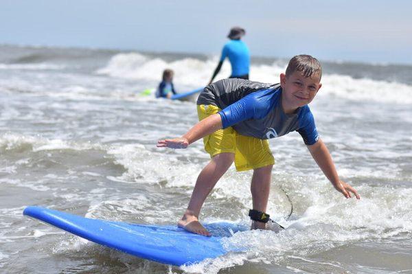 All smiles riding waves!