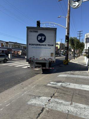 Idiot who almost ran us over. As you can see, his light was red to turn right and my light was green to WALK.