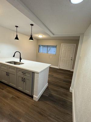 One bedroom, kitchen, and dining room