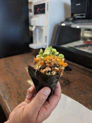 Salmon skin handroll and it was soo good. This picture doesn't do it justice because this thing was huge!