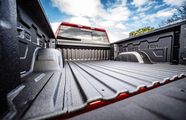 TOFF Bed liner The Best Bedliner near Boerne. Spray On Bedliners shown on a red truck