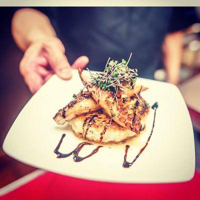 Spanish octopus served on riscotto