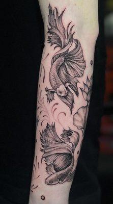 Beta fish and lotus flowers tattoos