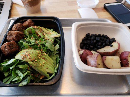Gluten free vegan toast with olive oil and a side of rosemary potatoes with black beans. TRUE breakfast of Champions.