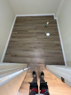 Installed new vinyl flooring , painted baseboards and installed new quarter round molding