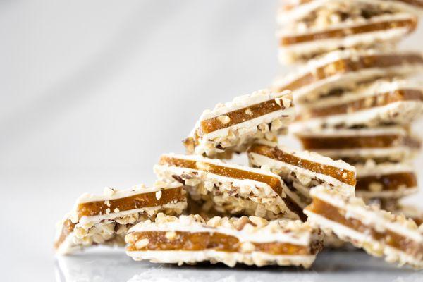 English Toffee with Almonds, coated in silky white chocolate