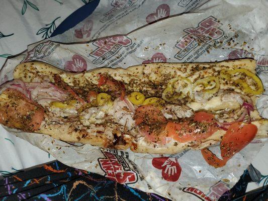 Squished and oregano attacked turkey and provolone sub