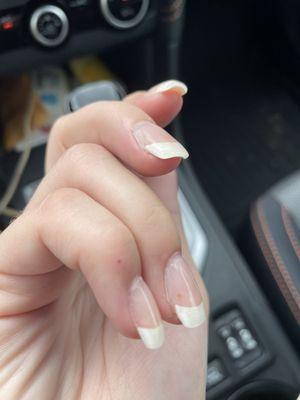 Peeling and left over debris that was just painted over after she filed