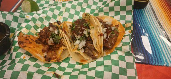 Al pastor, asada and birria tacos.