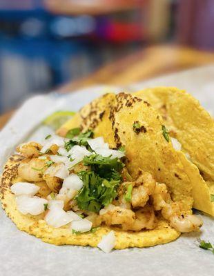 Shrimp tacos on house made corn tortillas. Superb. Like I been saying for years. Now they own this place Ole! :)..,