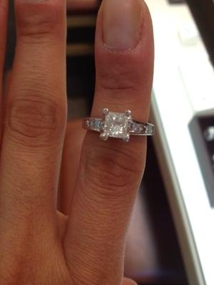 My poor destroyed engagement ring. Chipped center stone and all...