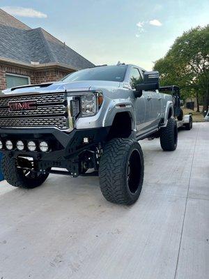 New Bumper, New Lights complete front end, shocks, Tires, balanced and aligned. GMC 2500 10+ inch lift.
