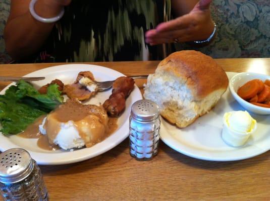 Pure comfort food! Pictured is a dinner roll as big as a loaf of bread. See  salt shaker for perspective.