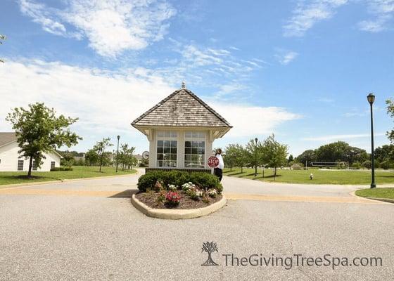 Drive through the security area to the Carriage house.