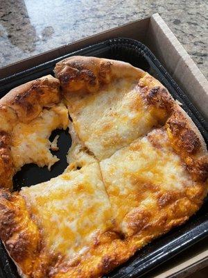 2 bites are missing, Daniel feels that HALF the pizza is gone, so he can't help me he says