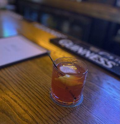 The Rudy Bloom with bourbon, Amaro, Aperol, blood orange, and lemon.