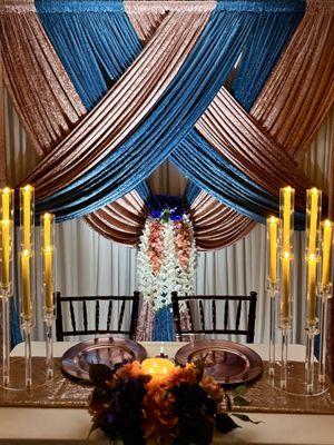 2-Layer Premium Backdrop with a lush floral arrangement artfully incorporated, bringing a romantic and timeless aesthetic feel.