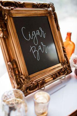 "Sophisticated mobile lounge with a cozy ambiance, offering a wide selection of hand rolled cigars."