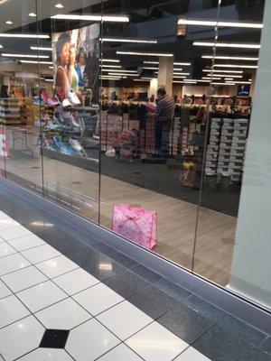 Outside of store looking in thru window.