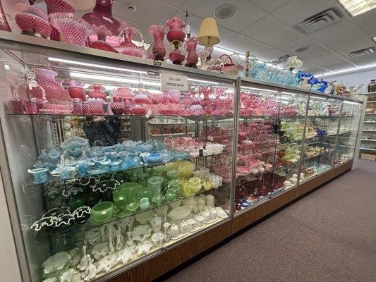 This is the most organized glass antique shop I have ever seen. All glass is organized by color and I love it.