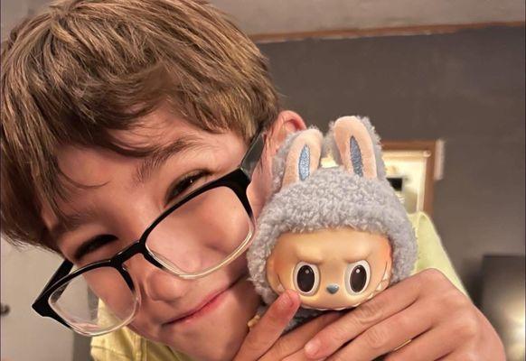 Happy Son with his Labubu