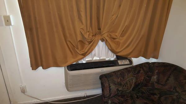 Curtains needed to be tied up to minimize the smell and to actually let the air into the room