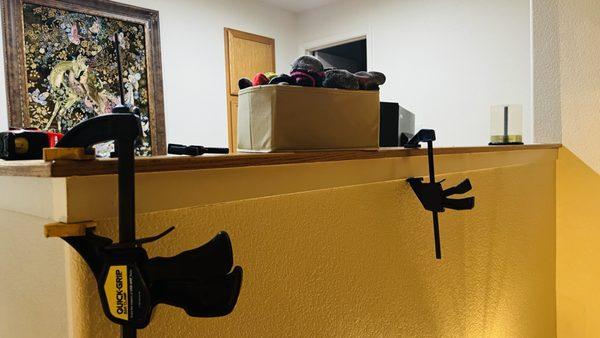 The oak trim was ripped away from the landing molding