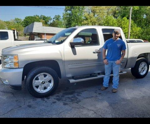 2011 Chevy Silverado and a very satisfied young man.