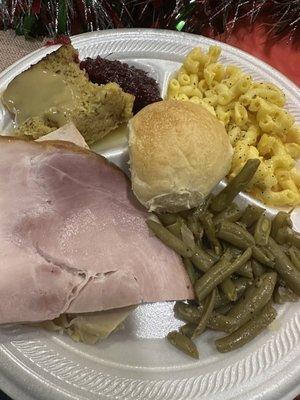 Catered meal..ham, turkey, dressing, Mac n cheese, green beans, roll.