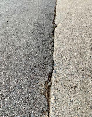 Crumbling due to grade started too high causing puddling and freezing in the winter.