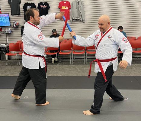 Kali/Escrima weapons training at Triumph Martial Arts in Pella!