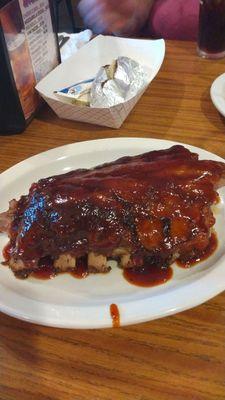 Bbq ribs full rack 14.95. Choice of potato and salad bar.