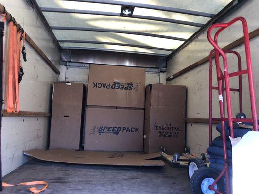 Picture of truck with company empty boxes taking up a lot of space in truck