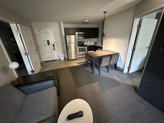 Living room, kitchen w/fire place