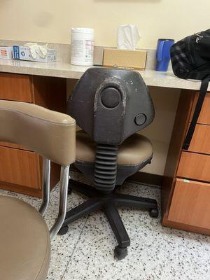 Another dirty chair. Even the over head light had mold or mildew growing on it.