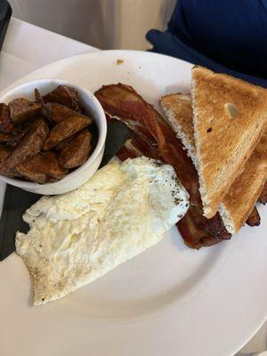 Egg plate with bacon, home fries, egg whites and sourdough