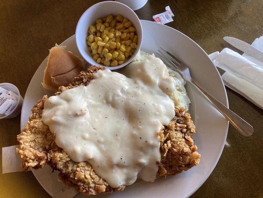 Chicken Fried Steak with corn and mashed potatoes. Delish