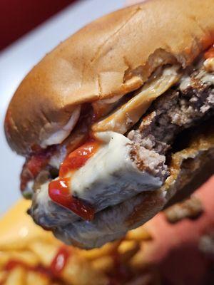 Close-up of the Black Dog Burger with all it added extra ingredients. Read the review to find out.